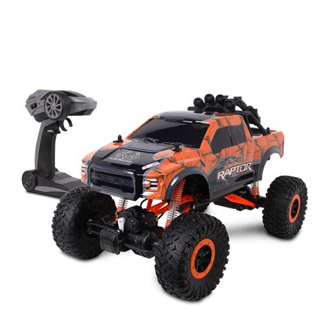 Scale: 1:14. Range: 2.4 GHz. Battery life: up to 40 min. Charging time: 80 min. Speed: up to 18 km/h. Batteries all included. Ready to run! Carrera 410042 RC Ford F-150 Raptor WhiteWith this remote controlled truck you steal the show! The orange-black flame design on the white background looks great and always makes you look like a winner!